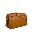 An Amelie Classic Shoulder Bag by Alinarifirenze, tan quilted crossbody bag with a gold-tone chain strap in Italian leather.